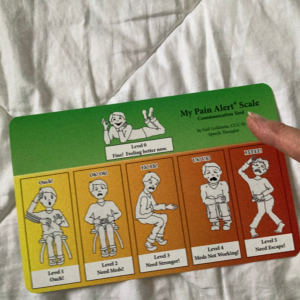 Finger pointing to MPAS card pictures